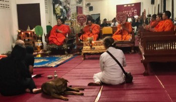  Attending a Buddhist funeral merit-making ceremony in Chiang Mai. 