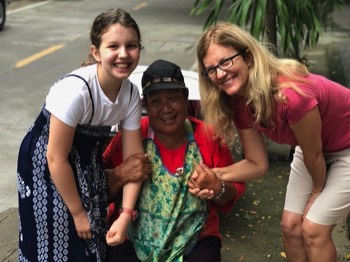  Kelly & Janaya ministering to a poor, street worker in Chiang Mai. She is a 'friend' we have known and ministered to for many years. 