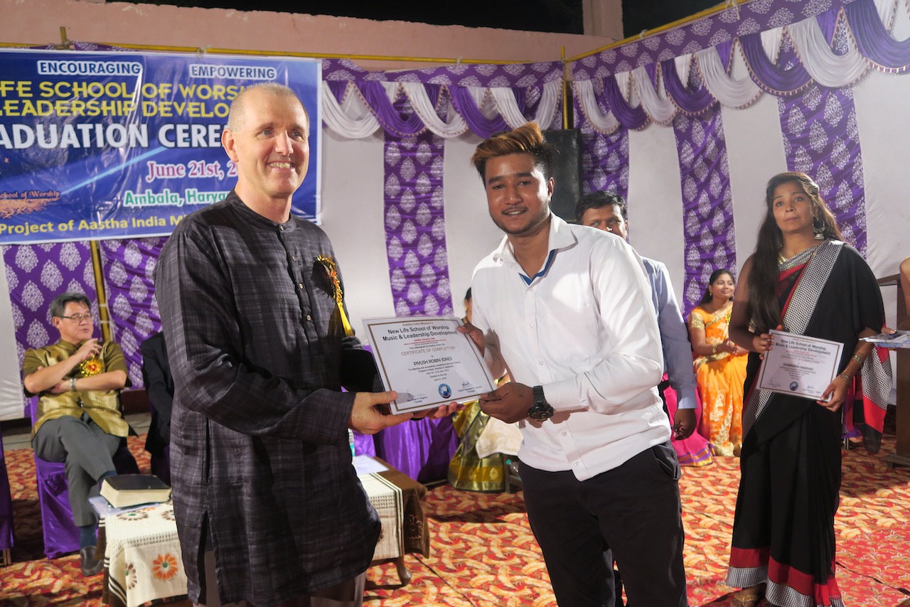  Joel presenting reward at SOW gratduation in East Asia on 6/21/2019 