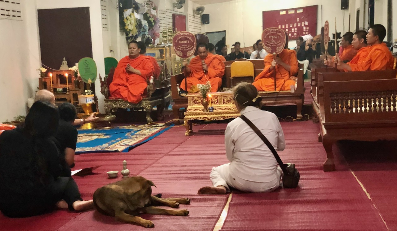  Attending a Buddhist funeral merit-making ceremony in Chiang Mai. 